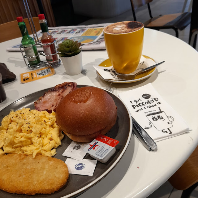 Scrambled Eggs with Milk Bun Bacon and Hash Bown